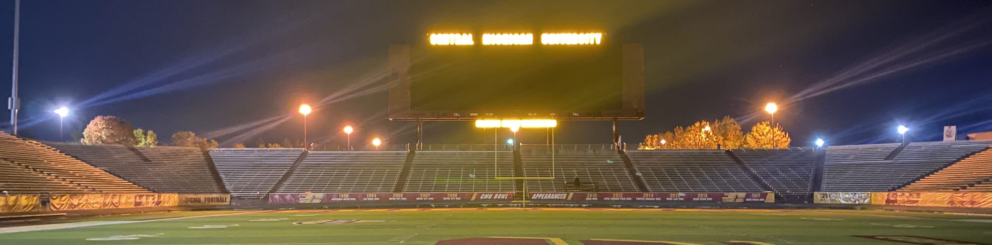 empty football stadium at night under the lights Springfield